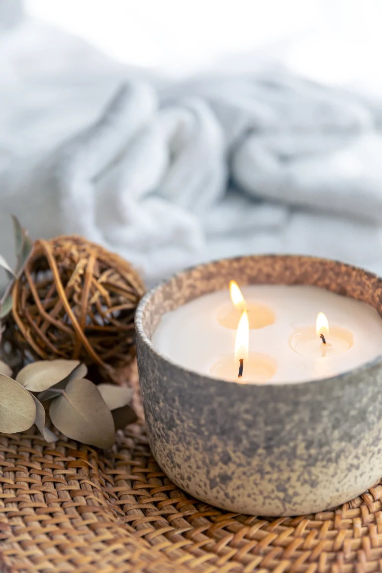 large-burning-candle-blurred-background